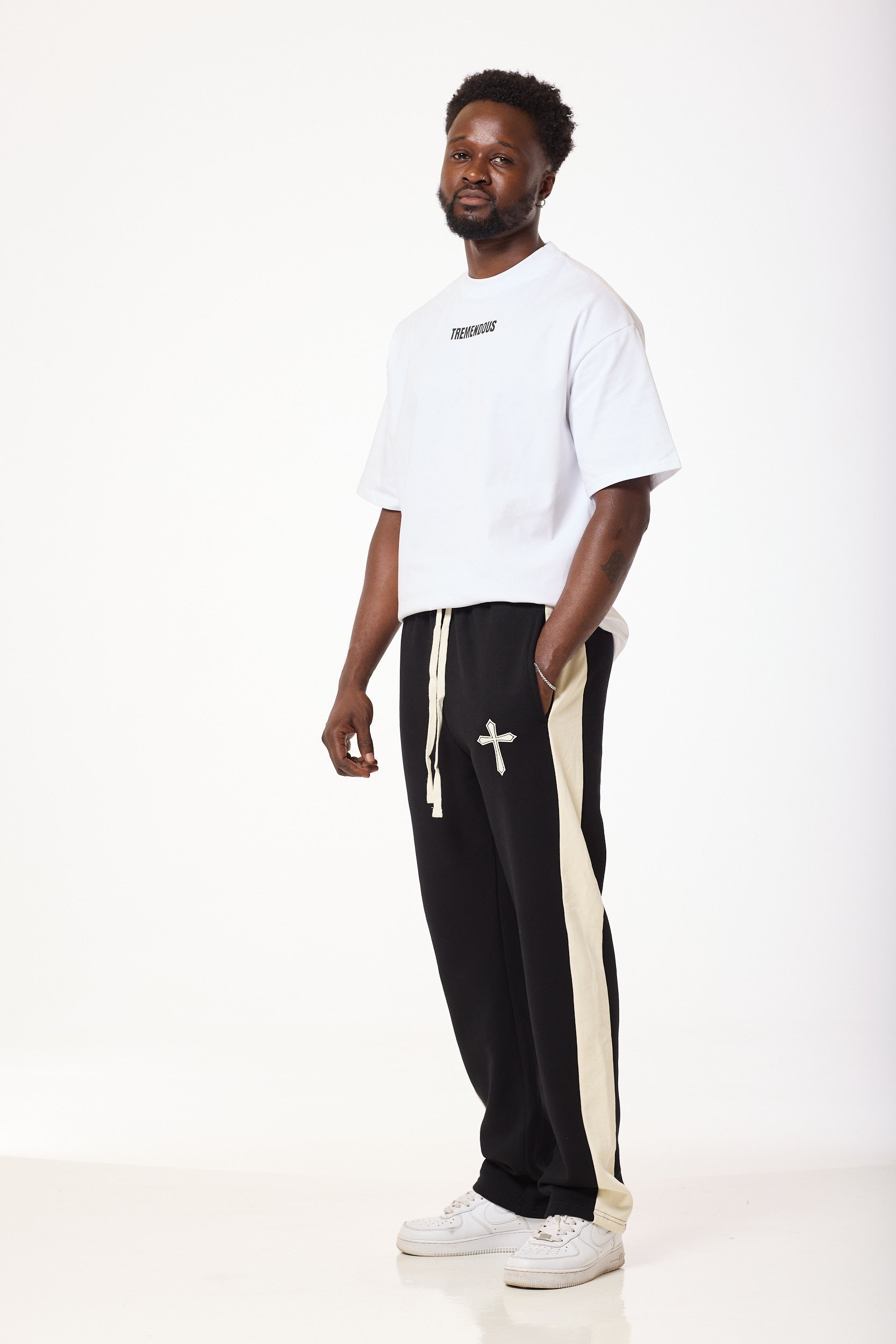 BLACK HEAVYWEIGHT JERSEY TROUSERS WITH CROSS AND STRAPS ON WAIST